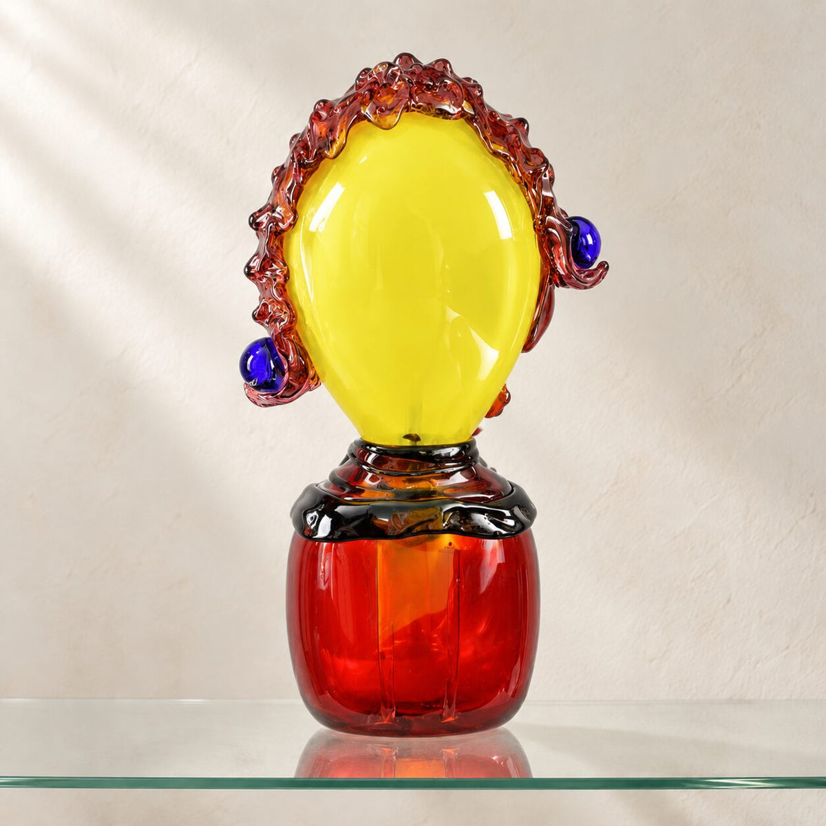 Buste de clown en verre soufflé polychrome, profil gauche