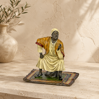 Bronze polychrome marchand arabe sur tapis style Vienne