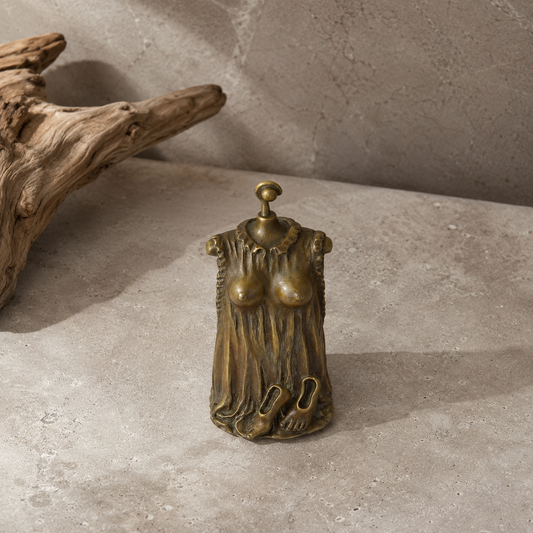 Cloche de table en bronze à décor de femme drapée dénudée