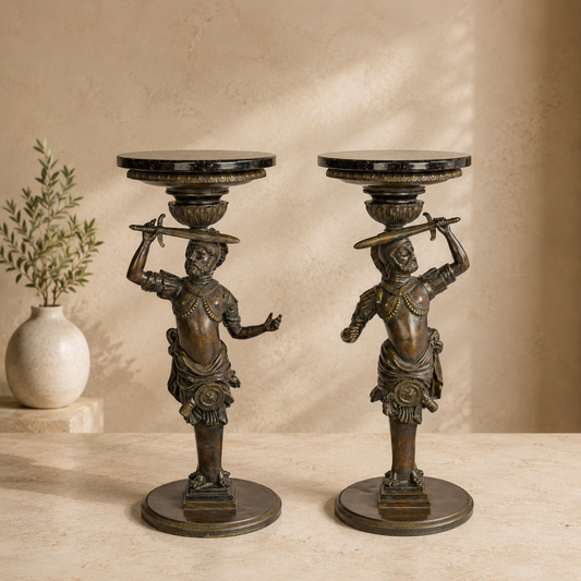 Paire de sellettes en bronze patiné à figures de Maures