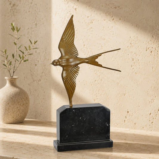 Sculpture Art Déco hirondelle en vol bronze doré socle marbre