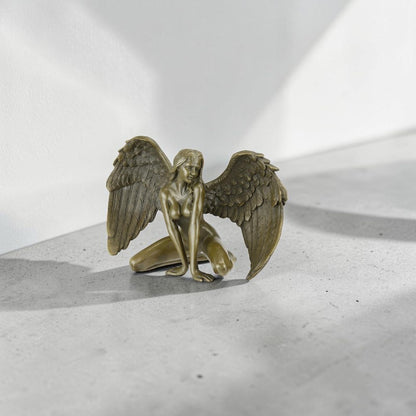 Sculpture bronze ange féminin agenouillé aux ailes déployées