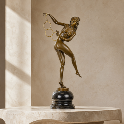 Sculpture bronze Art Déco danseuse nue aux anneaux