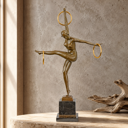 Sculpture bronze Art Déco danseuse nue aux trois anneaux
