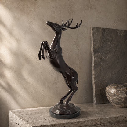 Sculpture bronze cerf cabré sur socle marbre noir veiné