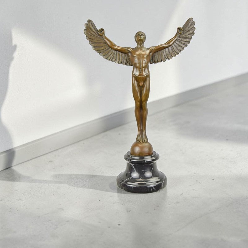 Sculpture en bronze Icare aux ailes déployées sur marbre