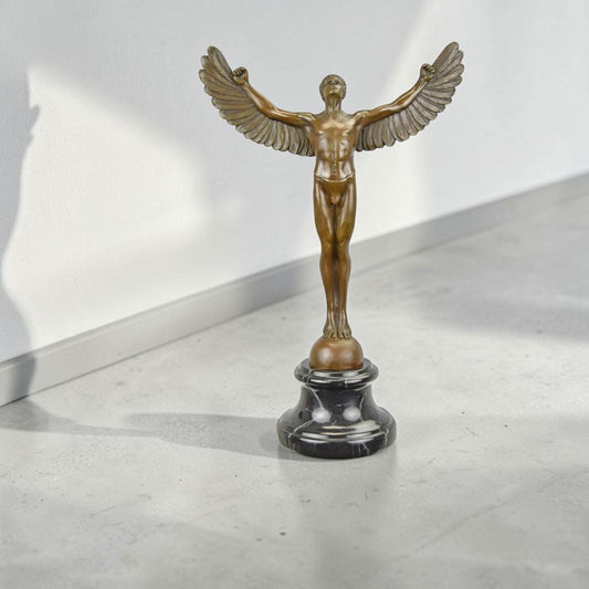 Sculpture en bronze Icare aux ailes déployées sur marbre