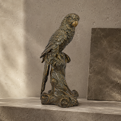 Sculpture en bronze patiné représentant un ara sur tronc